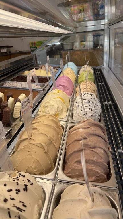 Bacio Cremeria gelato counter, flavors on display