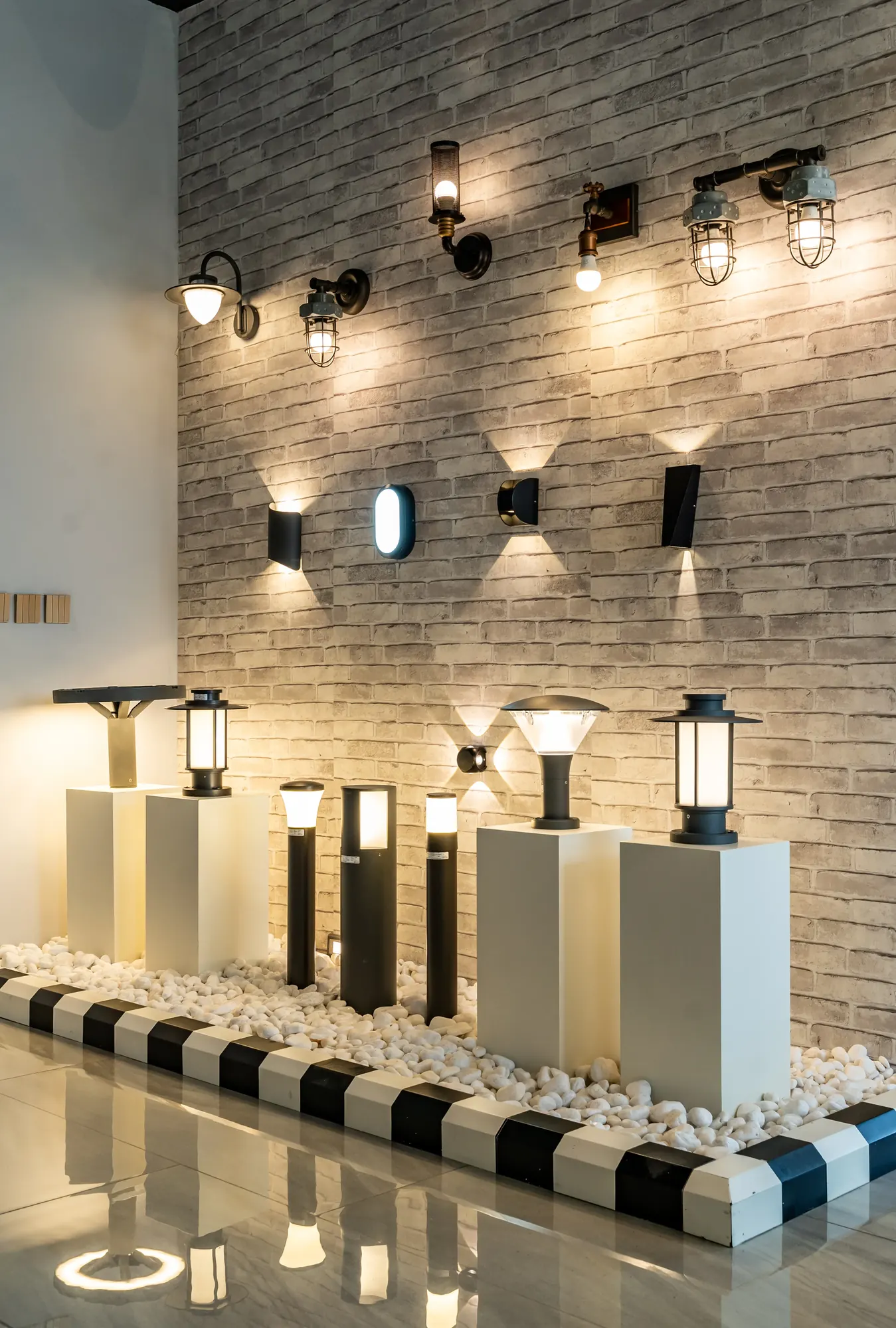 Outdoor wall and bollard lights on display