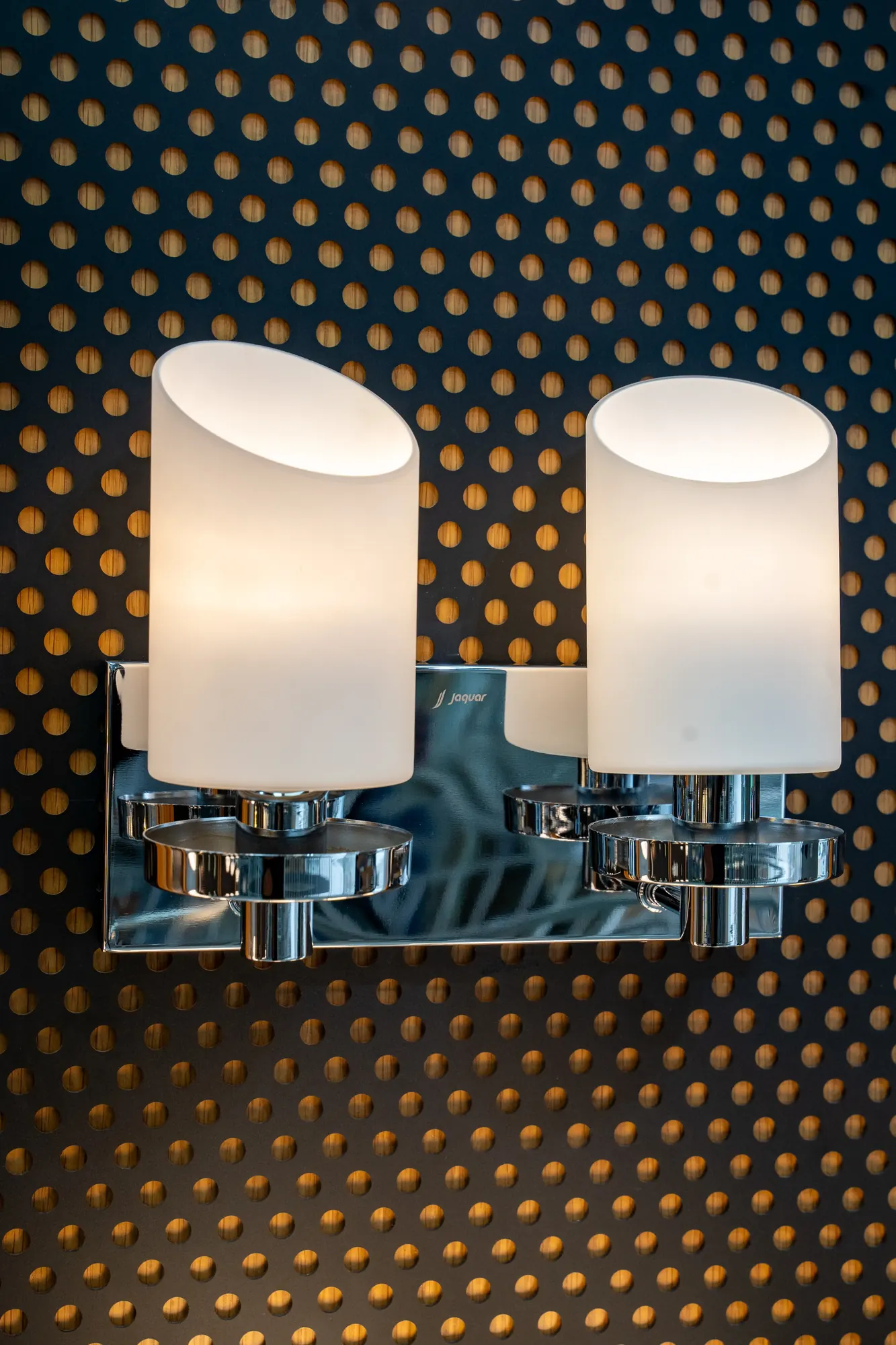 Twin wall lights with frosted glass shades