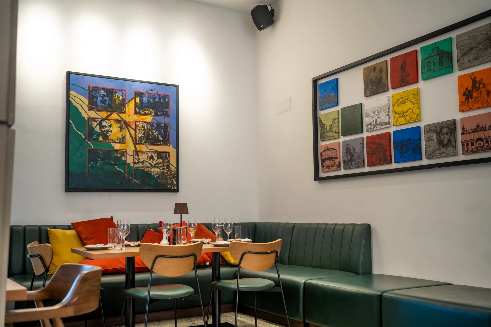 Lounge seating beneath framed Ethiopian art
