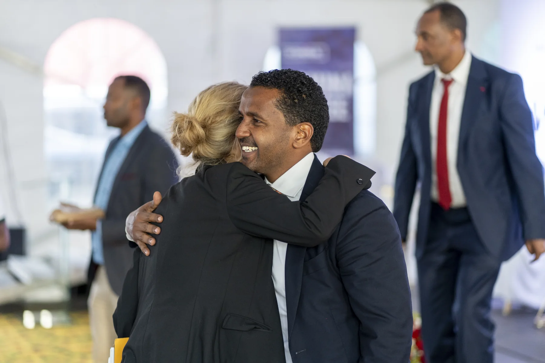 Guests greeting one another at the Tafo gathering