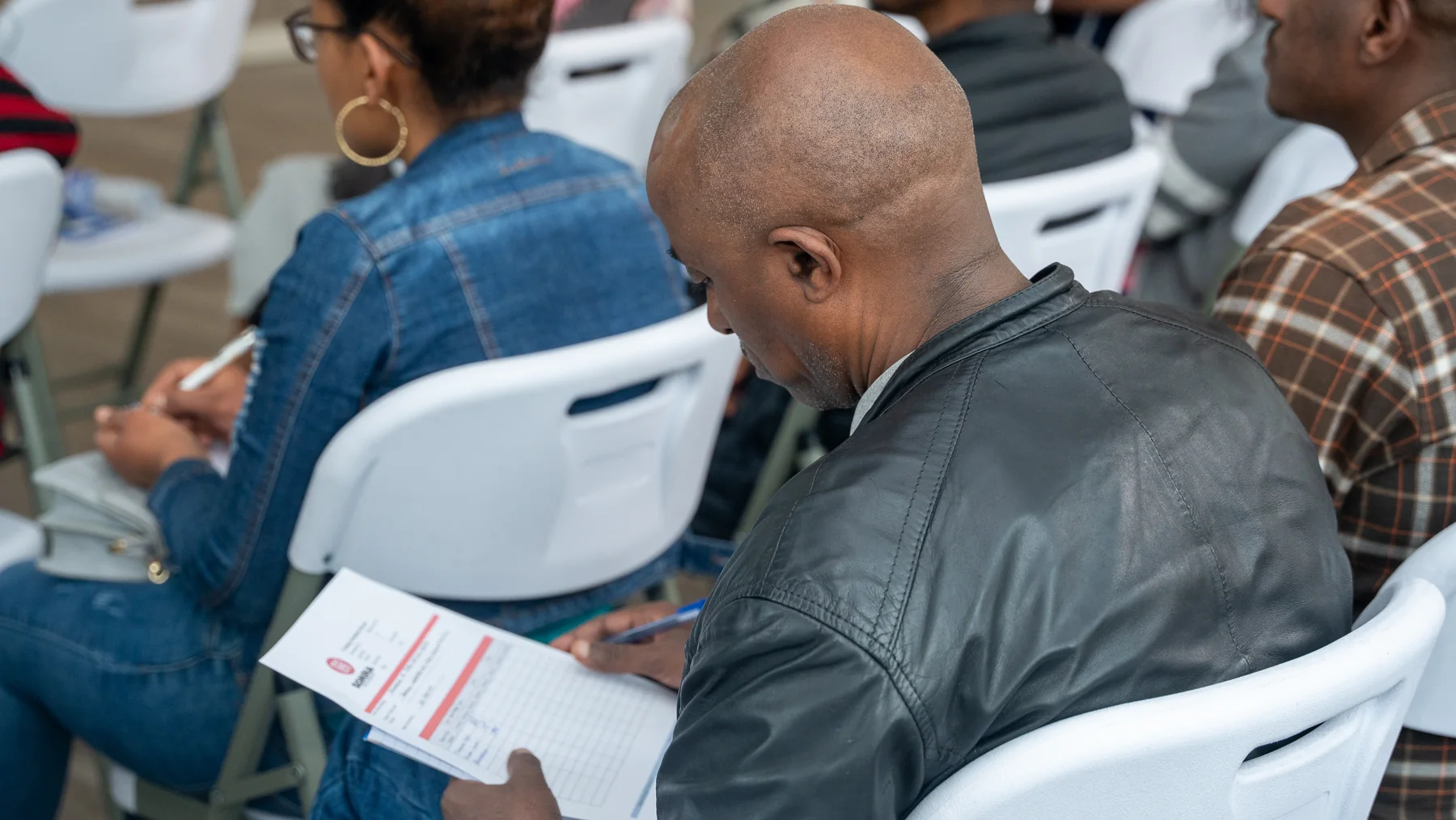 A team member reviewing training materials