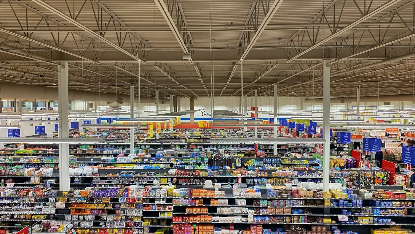 Supermarket aisles stocked with packaged goods